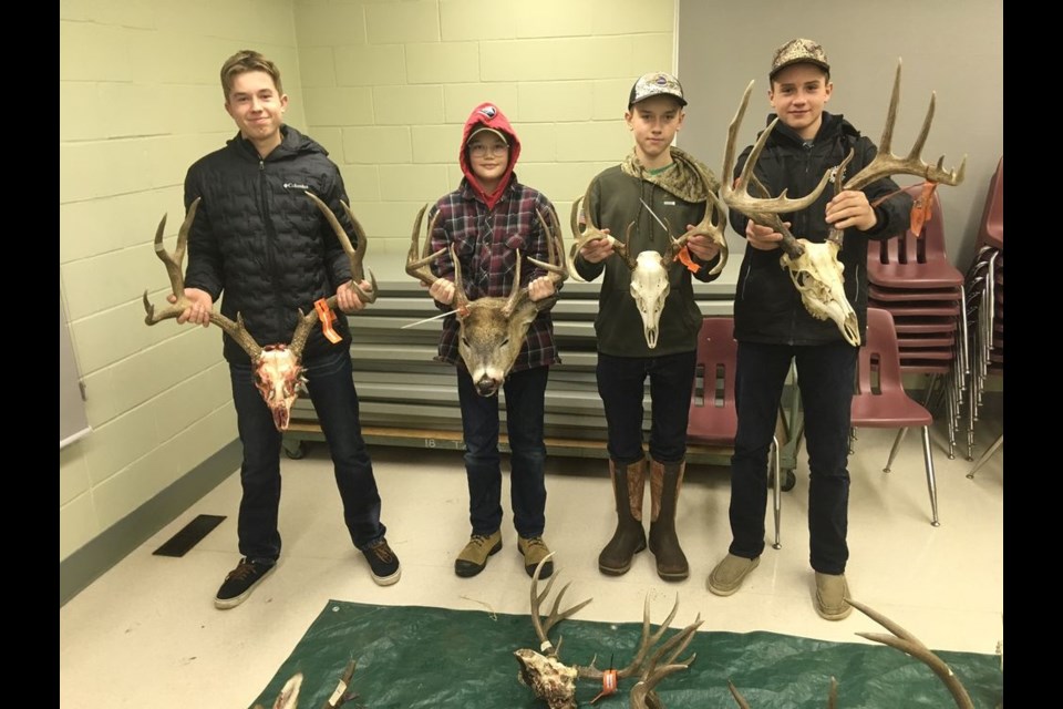 Among the youth who submitted 12 out of the 31 entries for the annual River Ridge Fish and Game antler measuring night on December 10, from left, were: Everett Paley, Gaspar Thomas, Devon Paley and Cooper Kraynick. / Kathy Thomas