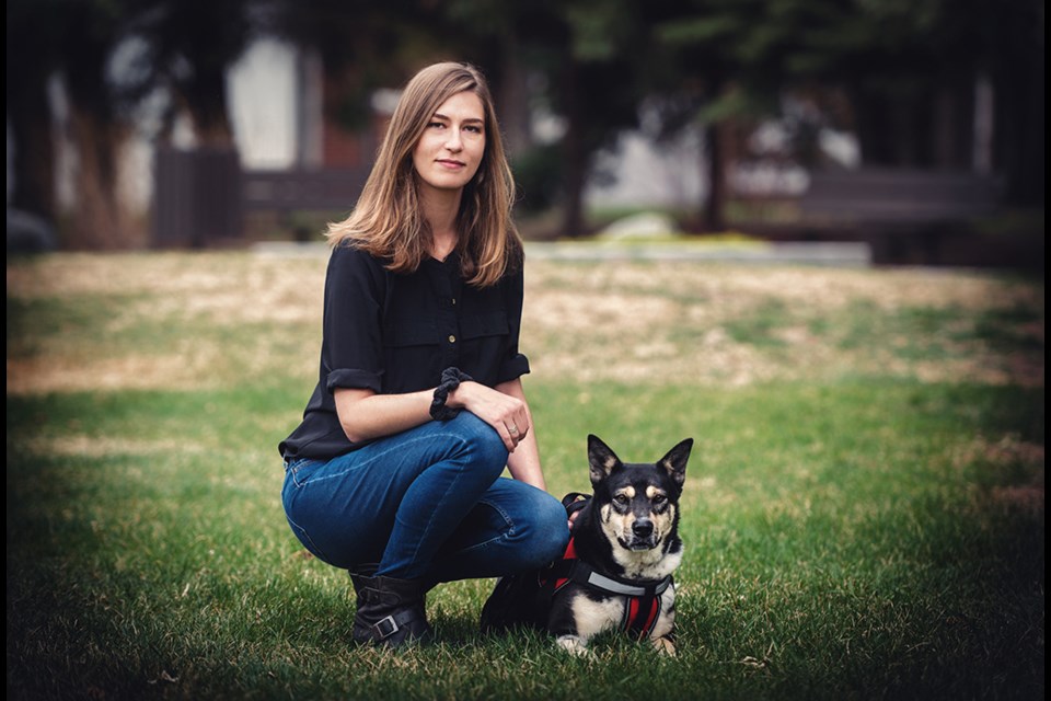 Alexandria Pavelich with therapy dog Zola. 