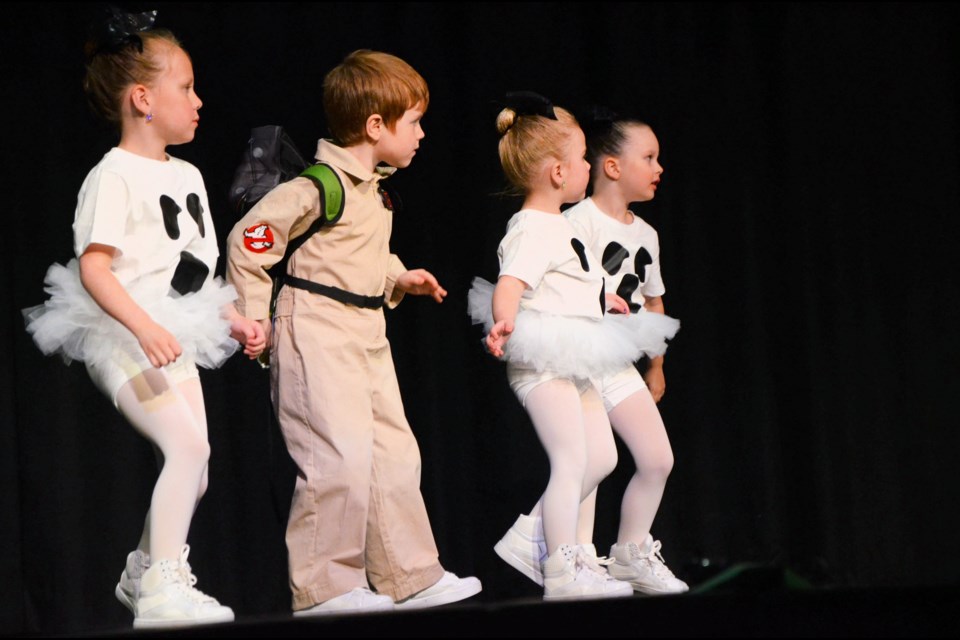 The littlest dancers have all their eyes on the teacher, ready to follow the next move in their hip-hop number to "Ghostbusters."