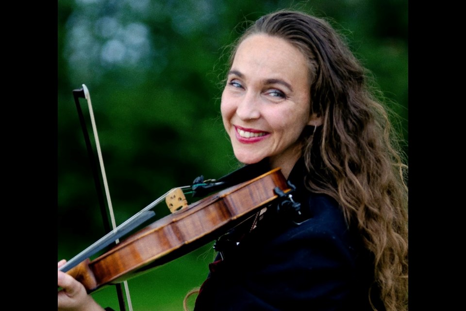 Anna Marie Bekolay, strings and guitar adjudicator. 