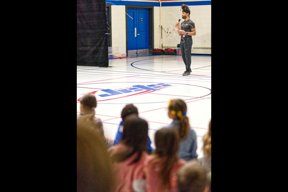 Darryl Thomas. artistic director with Rainbow Dance Theatre, explains how elements of dance and technology meld for the iLumiDance experience. The group performed at the Assiniboia Elementary school on Oct. 27.