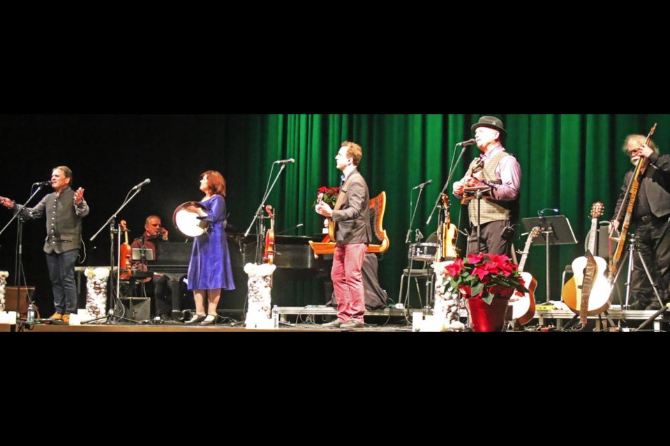 The siblings of the Barra MacNeils performed their Christmas show at the Cugnet Centre on Monday night, from left, Stewart, Seamus (on piano), Lucy, Boyd and Kyle.