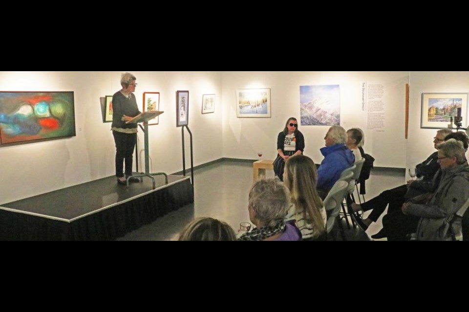 Linda Aitken of the Weyburn Arts Council gave comments to open the reception for "The Degenhart Effect" exhibit on Thursday evening.