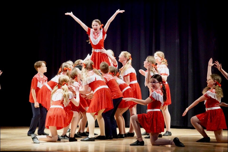 Miley Biccum was lifted as a part of pre-intermediate jazz's "Sin Wagon" performance at the Estevan Recreational Dance Club's recital on Saturday. 