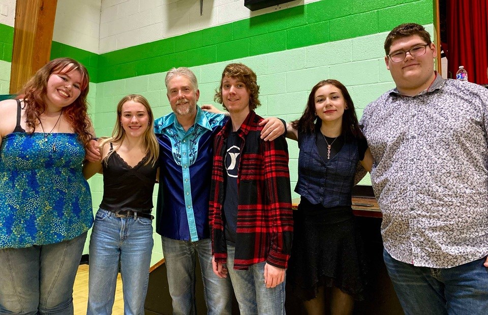 Luseland’s graduating jammers with their club leader, Chris Williamson