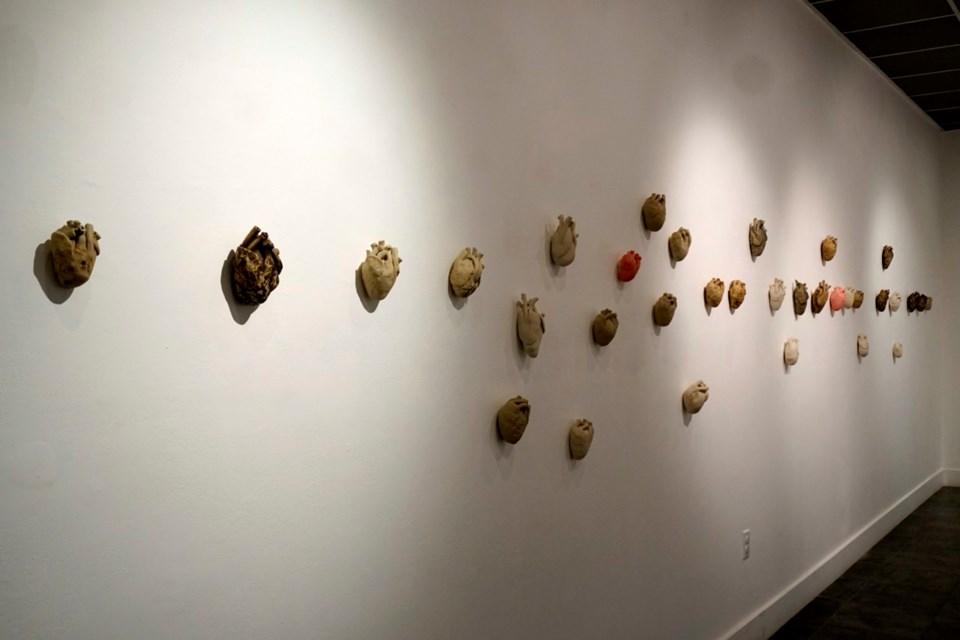 The King to the Ace by Karlie King is at Gallery 2 with multiple anatomical clay hearts on display.                                