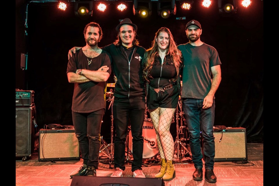 Taking the stage with Lara Taillon at The Roxy's Band Wars were Graham Tilsley on bass, Kyle Krysa on drums and Jeremy Brigham on guitar.