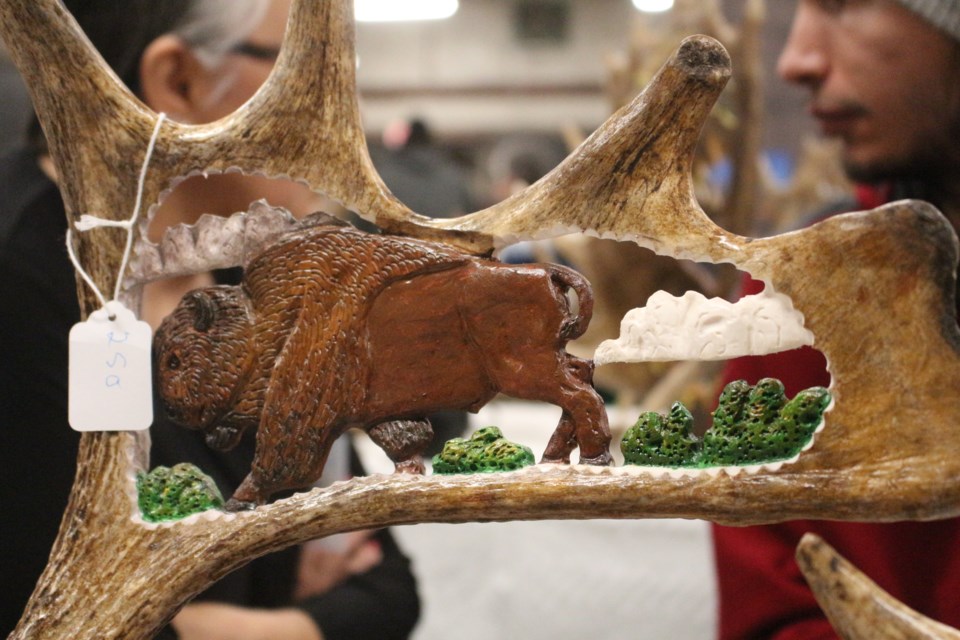 Dave Crook of Crook's Carvings uses moose antlers as a medium to carve intricate scenes.