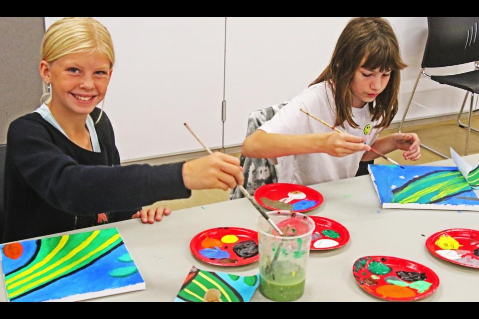 A Grade 6 class from Assiniboia Park painted squares that were later assembled into a large mural of a medicine wheel, as part of a Culture Days project on Wednesday.