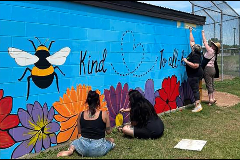 The vibrant new artwork, designed by local artist Krystal, was selected as one of the winning designs in a public voting.
