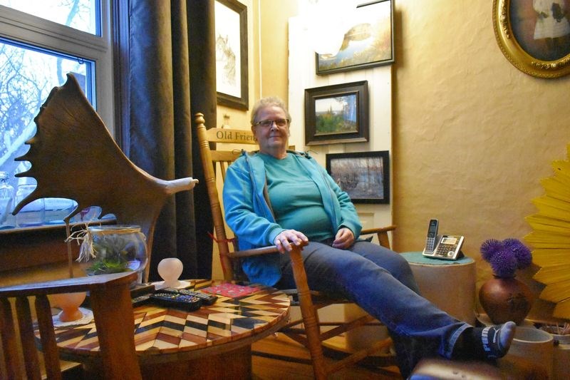 Rancher Nancy Weinhandl takes a well-deserved break in one of her favorite rooms at the heritage farmhouse at Fox Creek Ranch – a rural paradise with a stunning view of Duck Mountain Provincial Park near Kamsack.