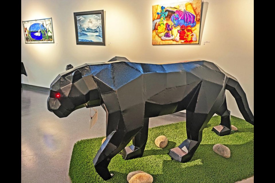 A black panther named "Pharaoh" in the foreground is one of 27 entries for the James Weir People's Choice exhibition, open now for voting until March 17 at the Weyburn Art Gallery.