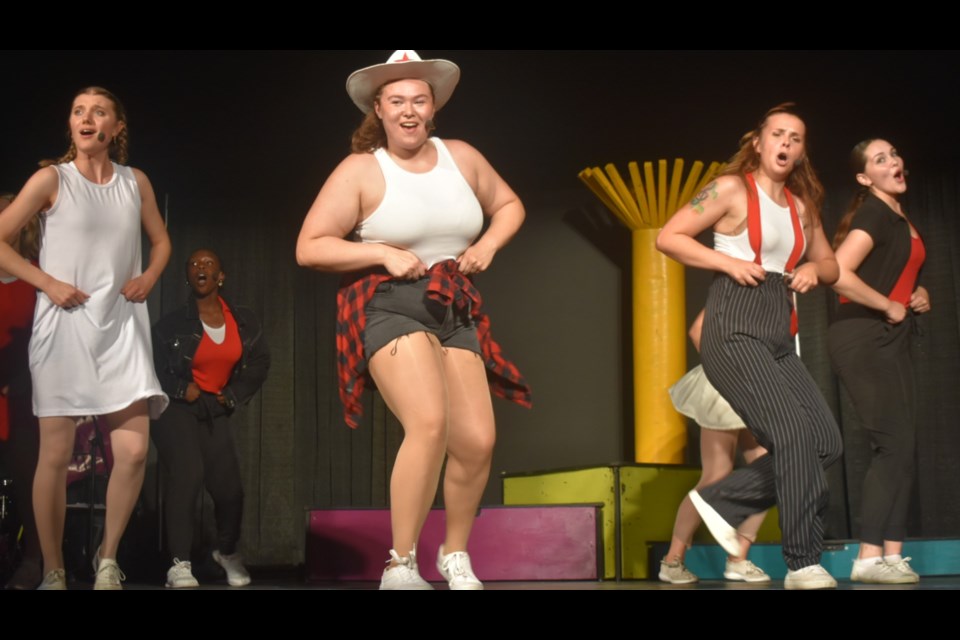 Elizabeth Bishop of Kamsack and female dancers performed a western number during Going for Gold, the summer tour of SaskExpress that was at the Kamsack Playhouse on Aug. 13.