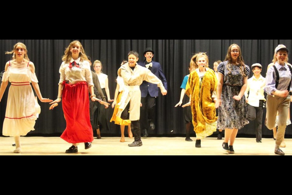 The cast of "Jump and Jive Juliet" dance in the opening number of the musical, to be staged by St. Michael students on May 5 and May 7.