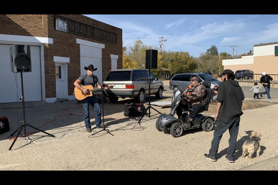 Performing on a street corner in Kamsack, Troy MacNaughton of Canora said he was touched by the people he met and the conversations they shared.