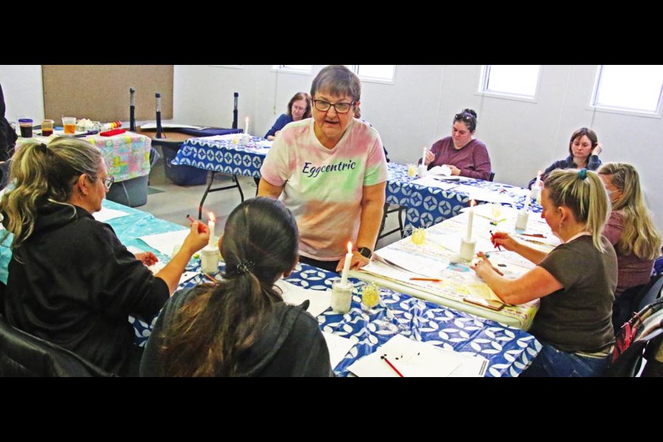 Instructor Sherry Klemmer answered questions from participants in a class on Ukrainian Easter eggs, or pysanka, on Saturday.