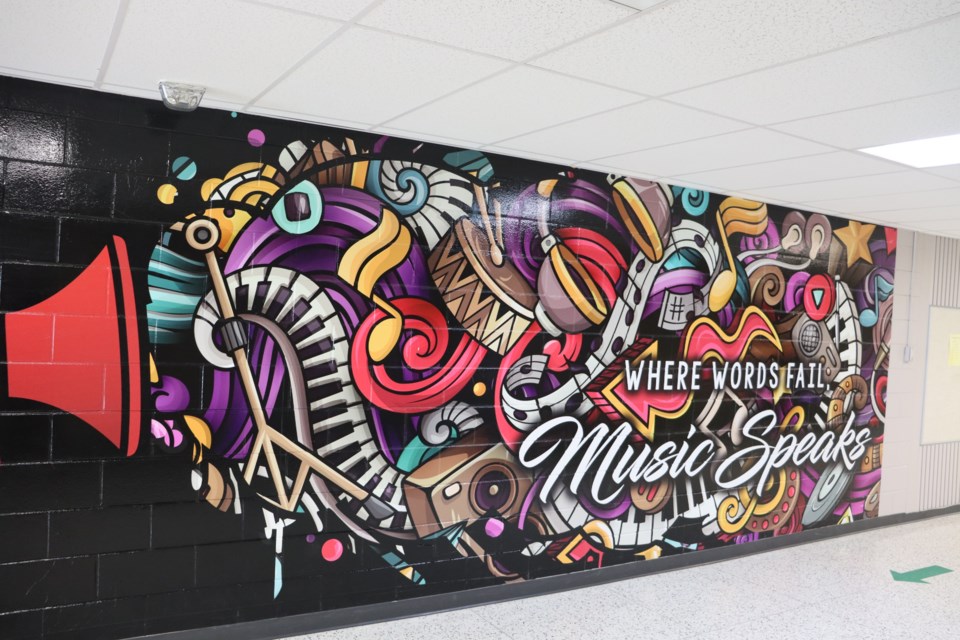 A musical mural covers the hallway just outside the band and choir rooms at the WCS