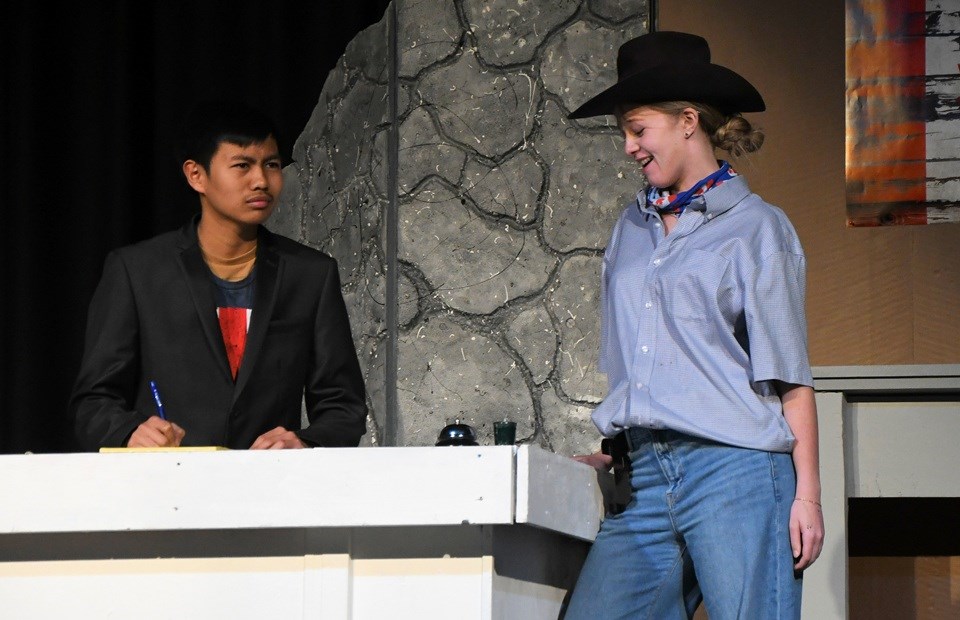 Ron Cordita as hotel manager Bitterman and Mayla Williams as Alberta in the UCHS drama production of It’s Murder, Eh?