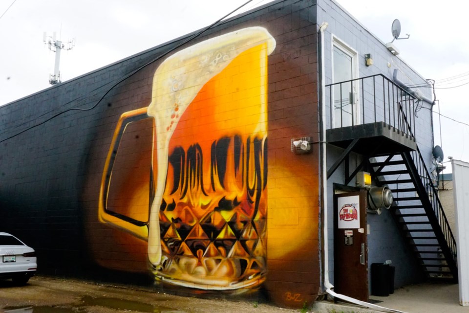 Another recent mural appeared on the back wall of Willy's the Tap House.