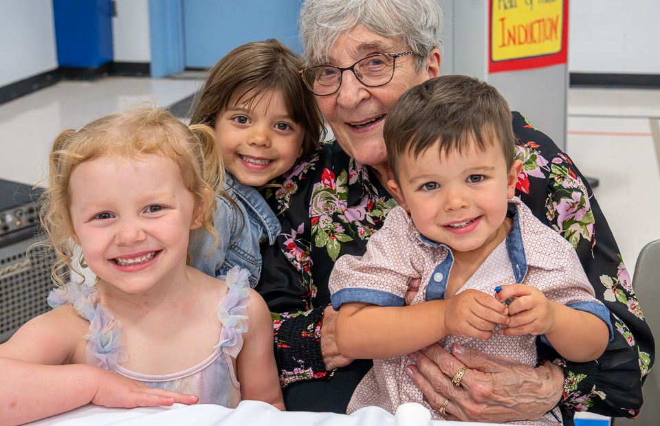 Jane Shury, CEO from Battleford, with her great-grandchildren.