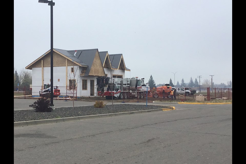 Here is a look at the construction of the new Oil Can Charlie’s in Battleford West, where a new roof was placed on the building Thursday.