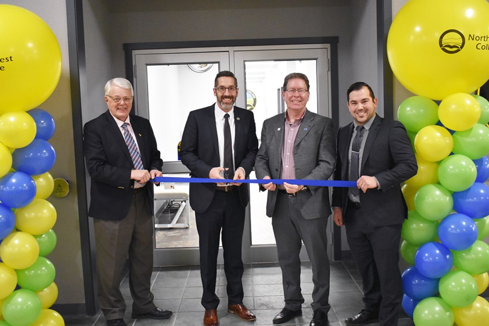 (Left to right) George Prudat chair of the college's Board of Governors, Dr. Eli Ahlquist the CEO and president at the college, David Gillan Mayor of the City of North Battleford, and Quin Kroschinski, a representative of Terracap Management Inc. cut the ribbon to officially open the Frontier Mall Learning Centre on Jan. 29