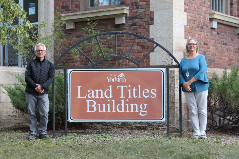 Kurt Stechyshyn and Lisa Washington pictured here in front of the Land Titles Building.