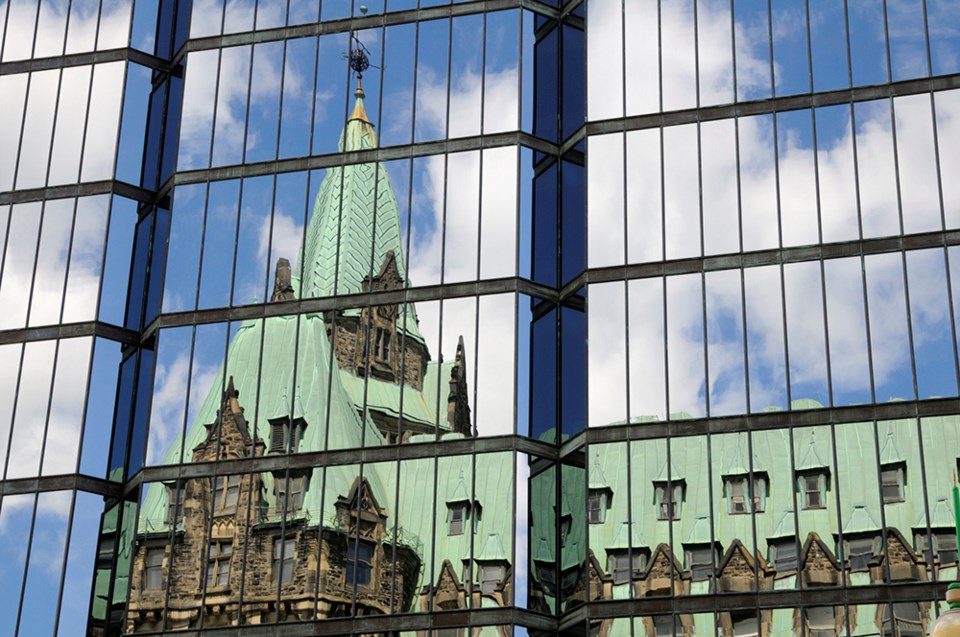 parliament reflected in glass