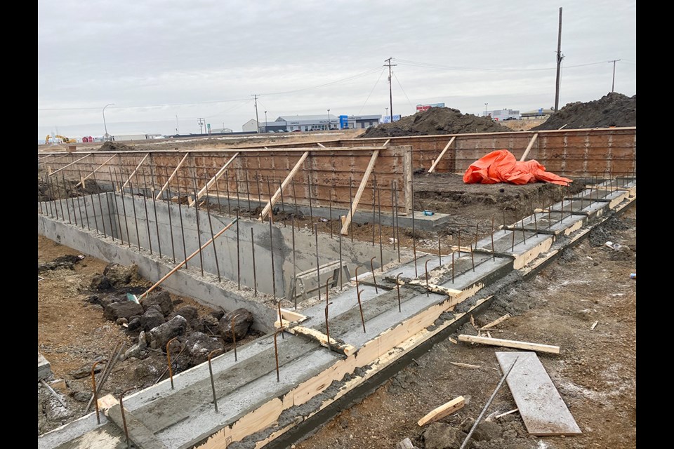  Pig Improvement Company (PIC) has started construction on their semi-trailer truck wash, located just west of the EZ Car Wash on Highway 13 in Carlyle. Penfor Construction of Blumenort, Man., is the contractor.