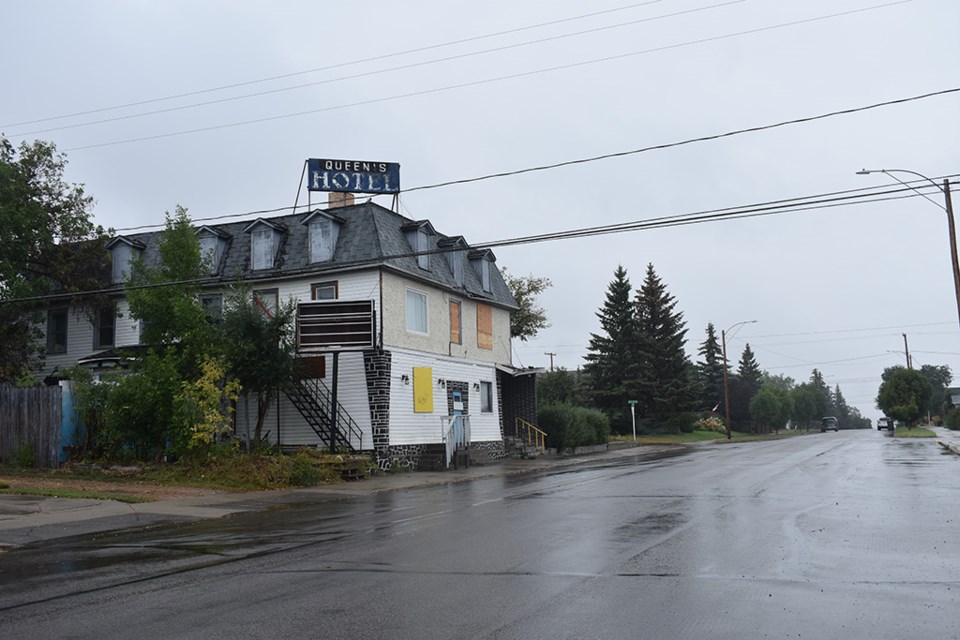 An increasingly dilapidated Queen's Hotel in Battleford, one of the oldest in Sask., pictured here on a rainy Aug. 22nd, the day after Battleford Town Council issued a notice of demolition