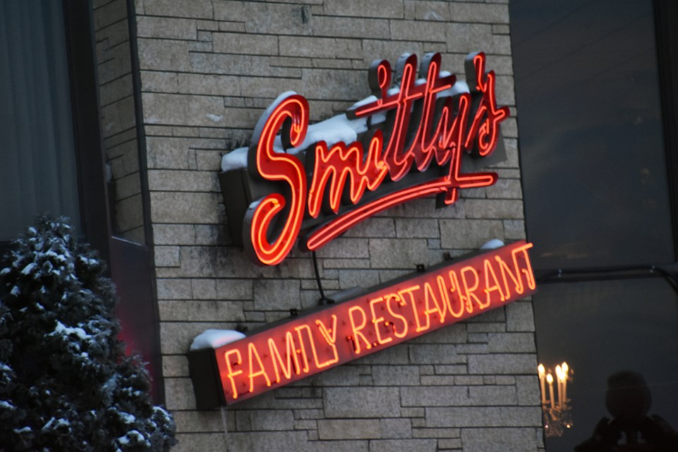 The Smitty's Family Restaurant sign on the side of the Tropical Inn in North Battleford, as of Jan. 25, 2024.