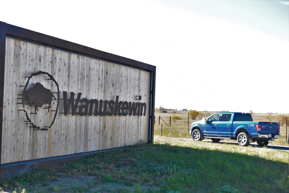 A car passes by the Wanuskewin Heritage Park sign. Visitor traffic was high on Thursday, the first National National Day for Truth and Reconciliation.
