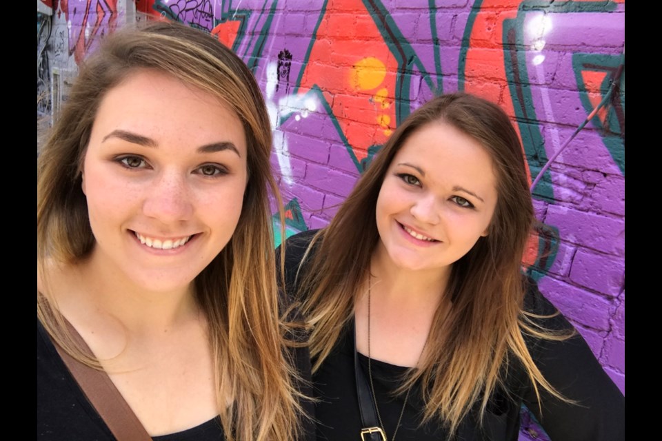 Breanne Van De Woestyne followed her dreams to build a career in the digital world. Pictured here with Kaitlyn Van De Woestyne, left, her sister and business partner at Impact Creative Digital Services. 