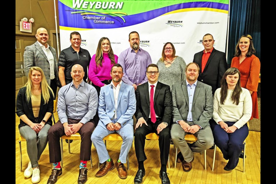 The board of directors for the Weyburn Chamber of Commerce gathered at the AGM on Wednesday at the Weyburn Legion. In the back from left are Rodney Gill, Jeff Walkeden, Jordan Szczecinski, Todd Hastings, Faye Billington, newly-elected director Ryan Skjerdal and chamber manager Monica Osborn. In front are Shandel Clark, past president Reed Anderson, vice-president Chad Bailey, president Steve Schuck, v-p Trent Nelson and Laila Bader.