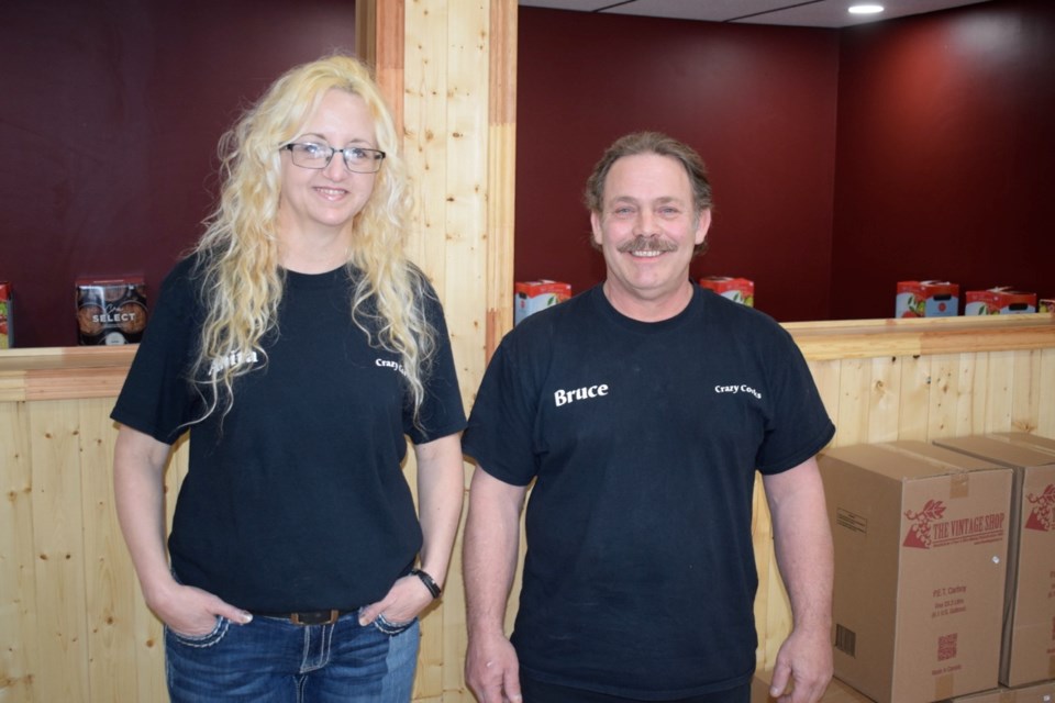 Anita Rieland and Bruce Craig are the owners of the new Crazy Corks business in Estevan. Their brewing room is in the background.