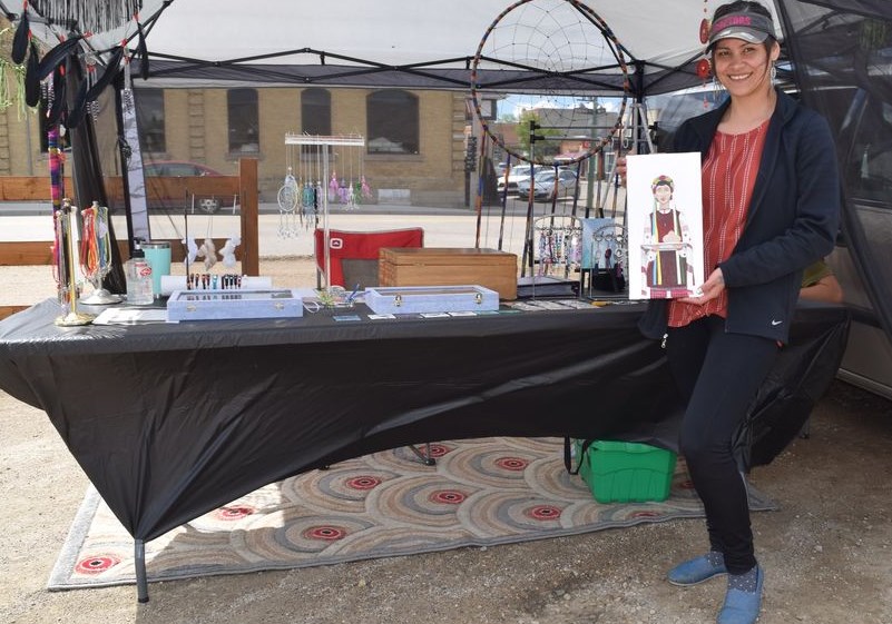 Darcie Park of Canora had Darcie’s Bohemian Artsody on display on June 16 outside the CN Station House Museum at the first weekly Farmers’ Market of the season. The display featured Park’s wide range of arts and crafts, including artwork depicting Canora’s Lesia statue. 