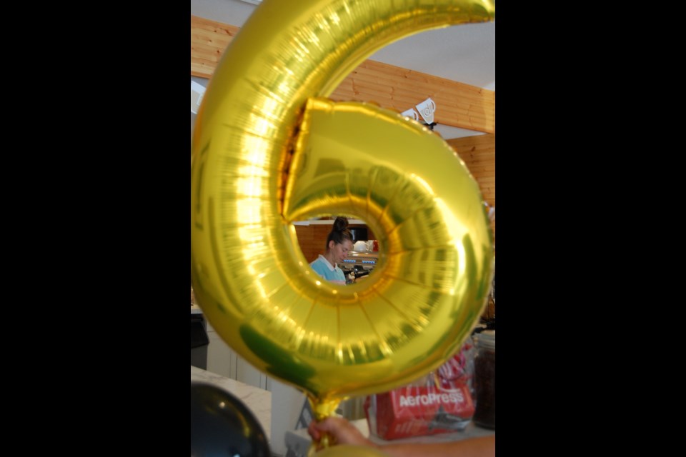 Brittaney Herbertson, the current owner of Rise + Grind, celebrated the business' sixth year with many customers.