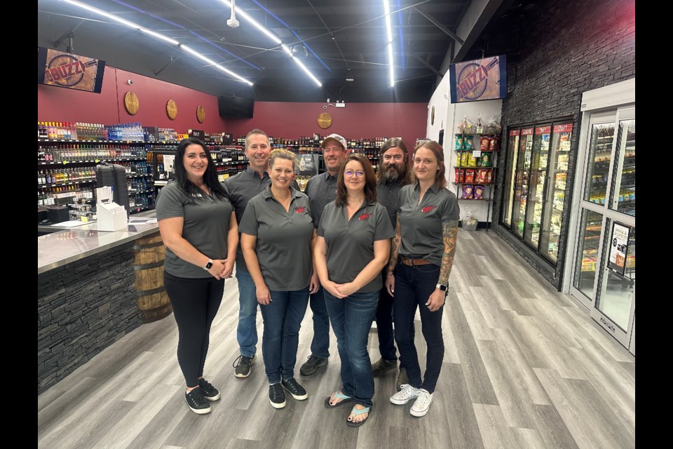  From left, Kandyce Meili, Jared Schlamp, Kristen Schlamp, Cary Wock, Shauna Wock, Jeremy Mack and Robyn Luedtke are eager to serve customers. 