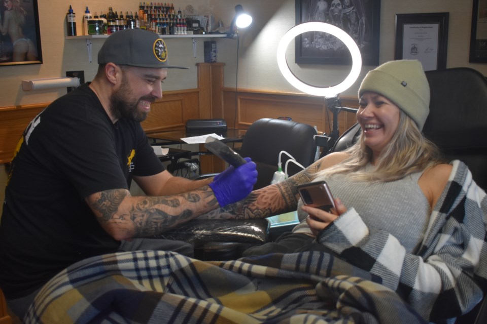 Due to an unexpected cancellation, Randy Leis decided to finish tattooing his wife’s sleeve.