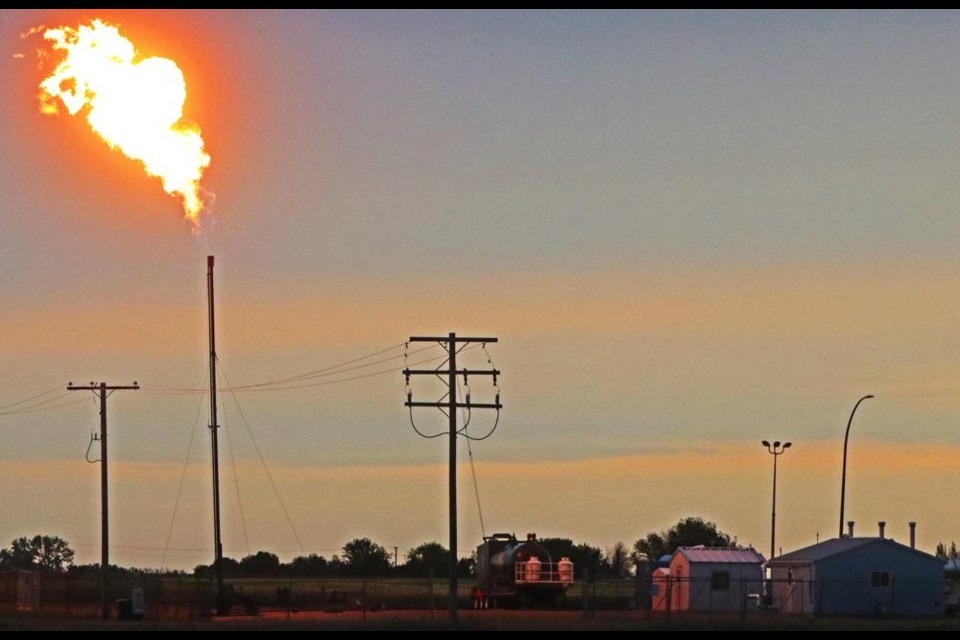 SaskEnergy's natural gas compressor station had this 40-foot flare going early on Thursday morning as part of the maintenance of the plant's systems.