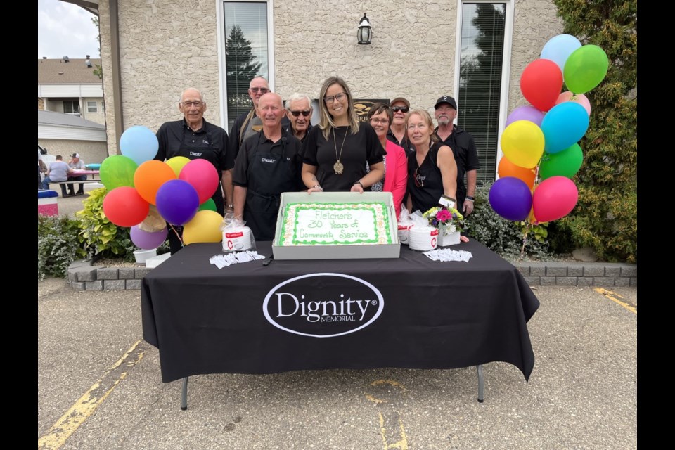 Staff from Fletcher Funeral Chapel and Cremation Services gathered for a celebration of 30 years of business during a community barbecue on September 8. From left are Frank Porte, Allan Seghers, Rick Moser, Morley Orsted, Tamara Seghers, Maeghan Hutchings, Ronald Klein, Cecile Sellinger and Jerry Ponto