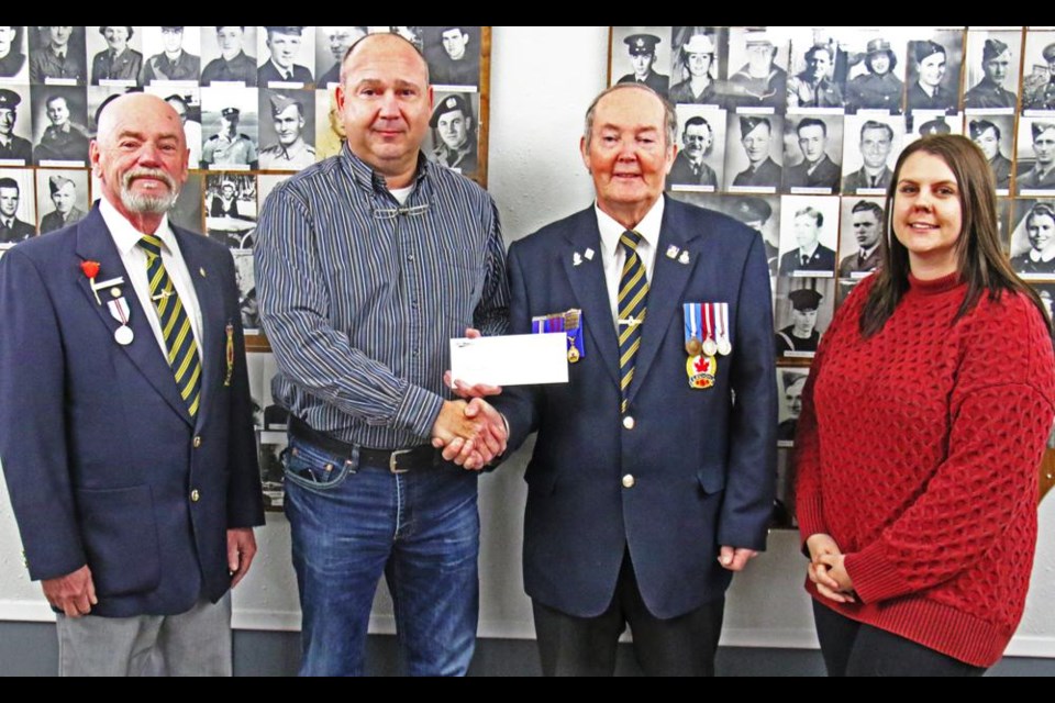 Representatives of Jerry Mainil Ltd. presented a donation of $2,500 the Weyburn Legion on Tuesday afternoon. From left are executive member Jerry Ponto; CEO Darcy McCormick of Jerry Mainil Ltd.; Legion president Brian Glass; and Rosalynn Meyer, safety/HR for Jerry Mainil Ltd. The funds will be used to help with repairs and ongoing operations of the Weyburn Legion Hall.