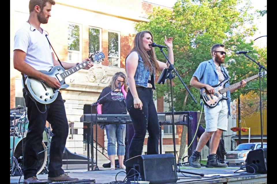 The Weyburn Credit Union featured singer Karissa Hoffart and band, doing the "Women of Rock" show on stage.