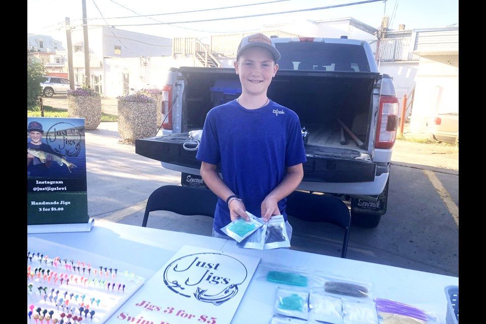 Levi Garagan with some of the fishing equipment he has available through his business Just Jigs.