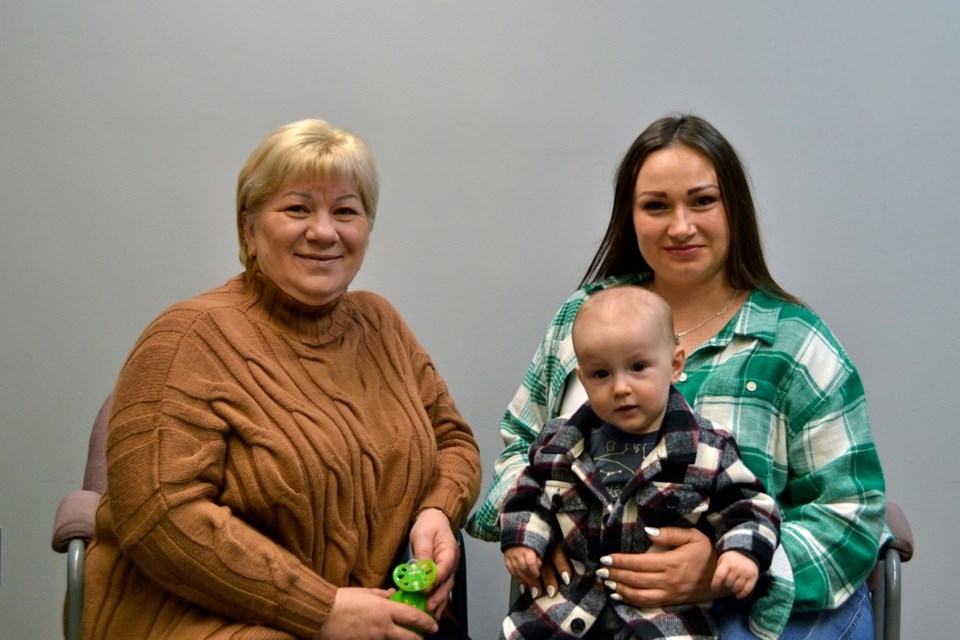  Irina Butenko, right, and Nadiia Kuliak, pictured here with her son David, recently started the new Ukrainian cuisine catering business called Odessa Food Workshop.