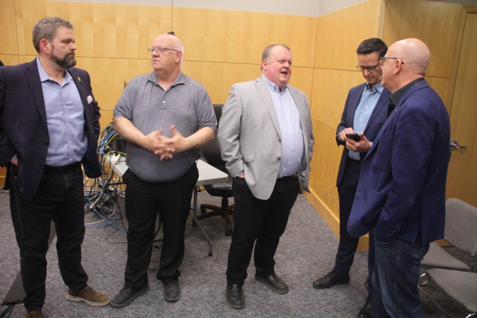 Mark Cooper, PCE’s president and CEO, (far left) met with City Councillors on April 17. 