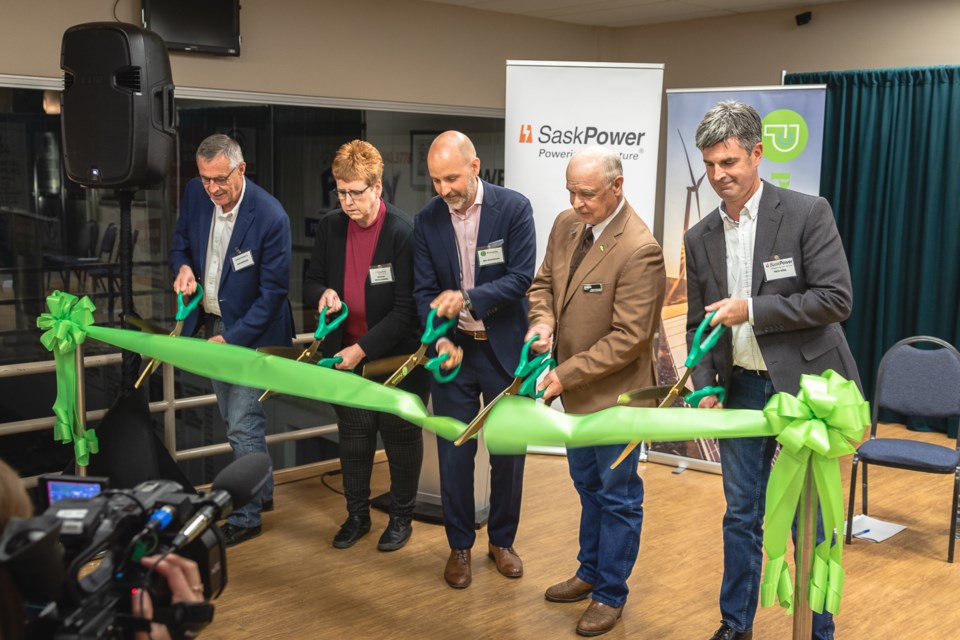 A ribbon cutting ceremony was held for the Golden 鶹ýAV Wind Facility in Assiniboia that took place on June 14. From left are Don Morgan, Government Minister responsible for SaskPower; Sharon Schauenberg, Mayor of Assiniboia; Ben Greenhouse, Senior VP of Growth for Potentia Renewables; Norm Nordgulen, Reeve of the Lake of the Rivers RM; Troy King, acting President and CEO of SaskPower.