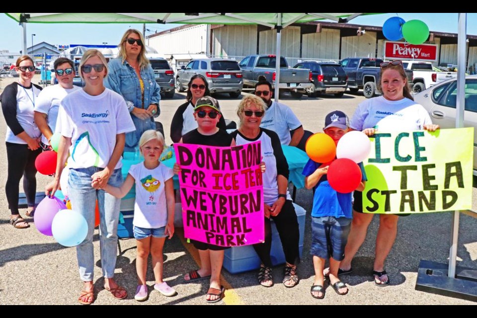 The group of SaskEnergy office employees plus some friends and family gathered to sell iced tea and Rice Krispie squares for the Weyburn Therapeutic Animal Park on Aug. 16, and they took in donations until Friday to raise over $1,700 in total.