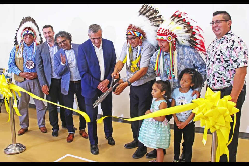 The ribbon was cut to officially open the Pesakastew solar power project on Tuesday afternoon, in a ceremony held at the Credit Union Spark Centre. From left are David Pratt, vice-chief of the Federation of Sovereign Indigenous Nations; Robert Apold, Natural Forces Solar; Rupen Pandya, new CEO and president of SaskPower; Don Morgan, minister responsible for SaskPower; Chief Byron Bitternose of George Gordon First Nation; Chief Michael Starr, Star Blanket Cree Nation; and Guy Lonechild of the First Nations Power Authority.