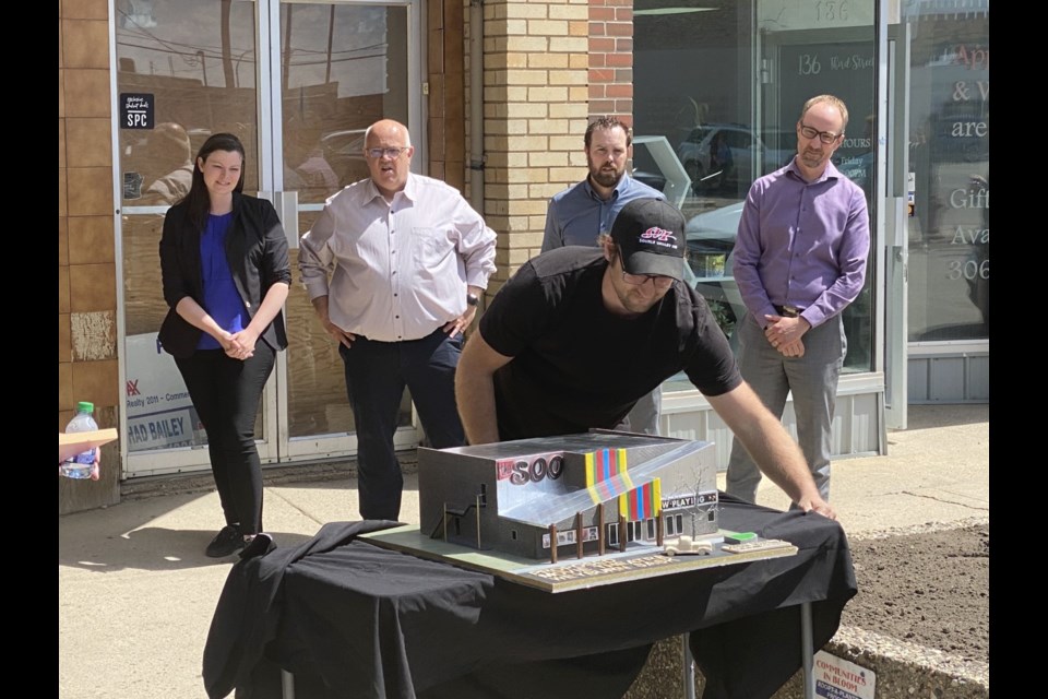 A model for a modern, two-screen theatre in downtown Weyburn was revealed during the announcement.
